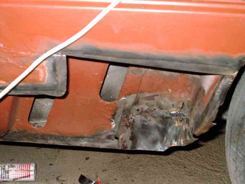 welding on the nearside rear quarter of a Fiat X1/9 1980 in arrancio metallic